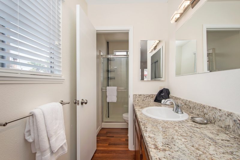 View of the primary bedroom's en suite bathroom with a walk-in shower.