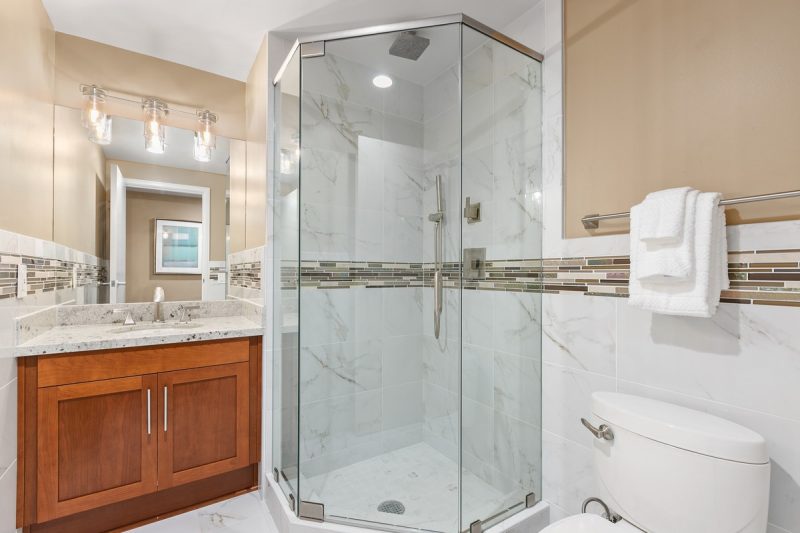 Guest bathroom with spacious shower.
