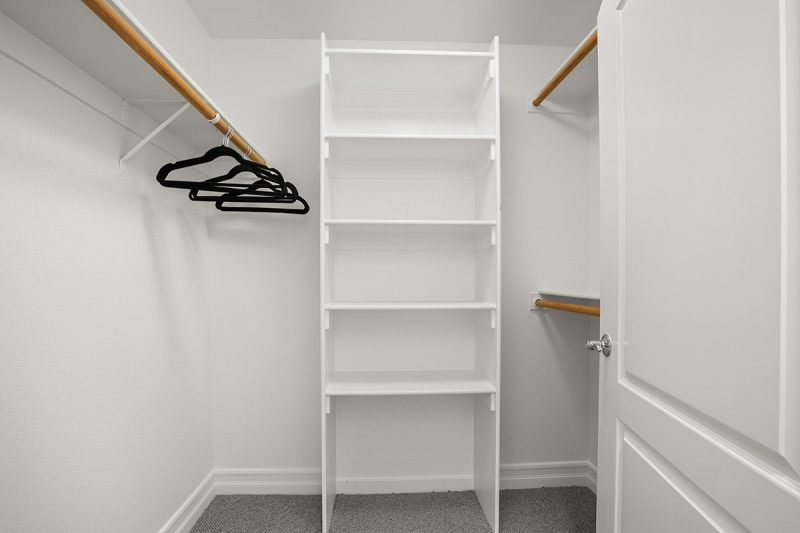 View of the spacious primary bedroom closet.