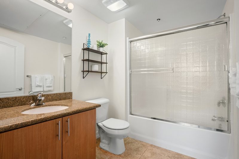 Guest bathroom with a combination shower-bathtub.