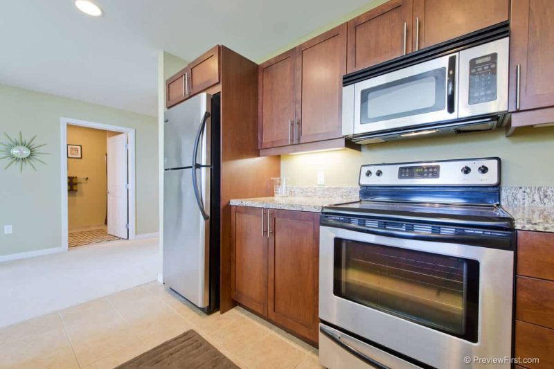 Updated kitchen with stainless steel appliances.