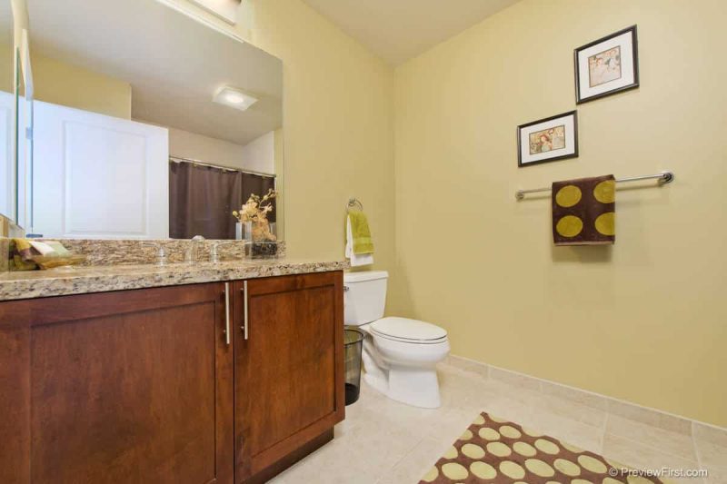 Guest bathroom with combined shower-bathtub.
