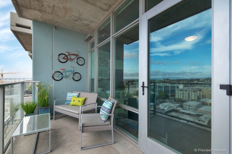 Well-appointed patio with cityscape views.