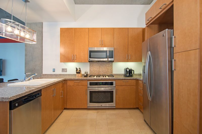 Updated kitchen with stainless steel appliances.