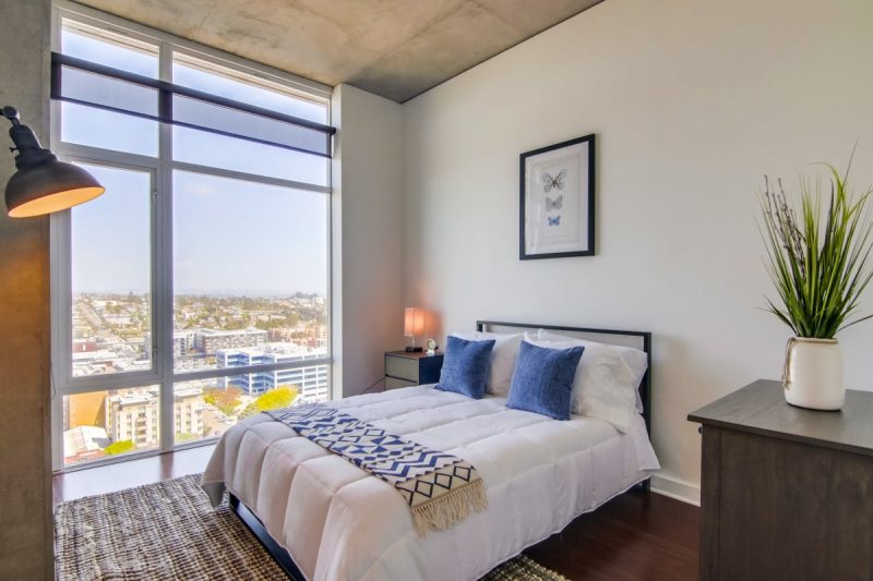 Guest bedroom with lovely views of the cityscape.