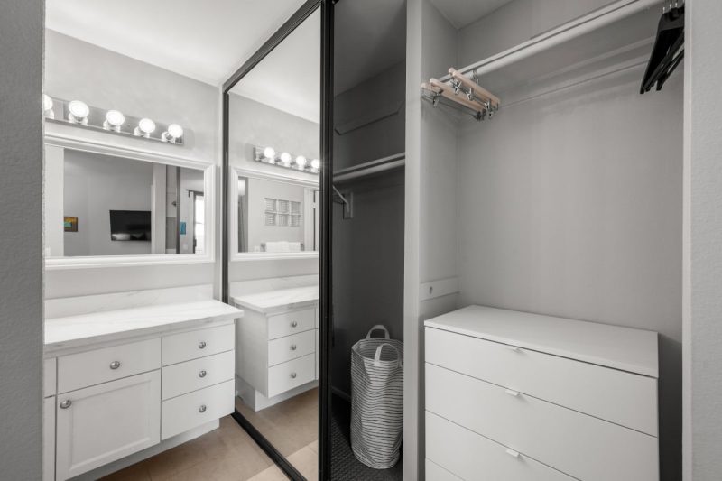 Ample storage space in the bedroom with a large closet of drawers.