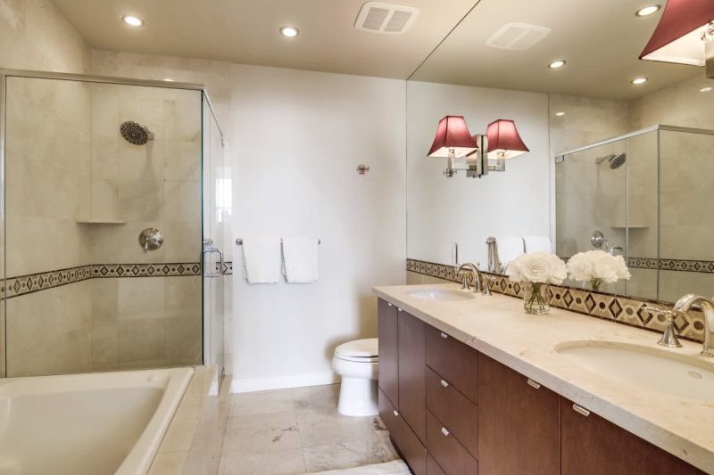 Walk-in shower and freestanding bathtub in the master bathroom.